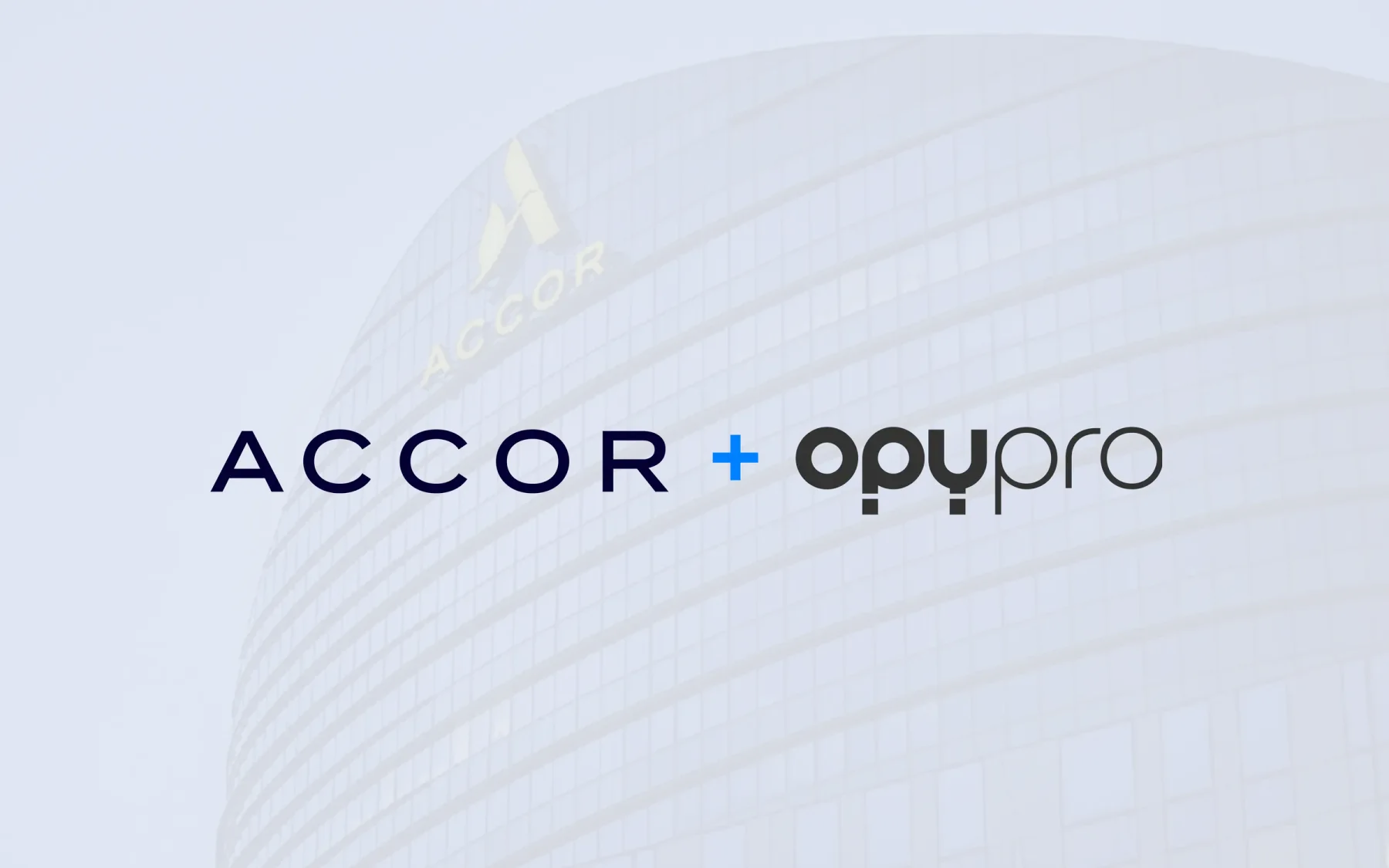 Accor and Opypro logos over the Accor headquarters building